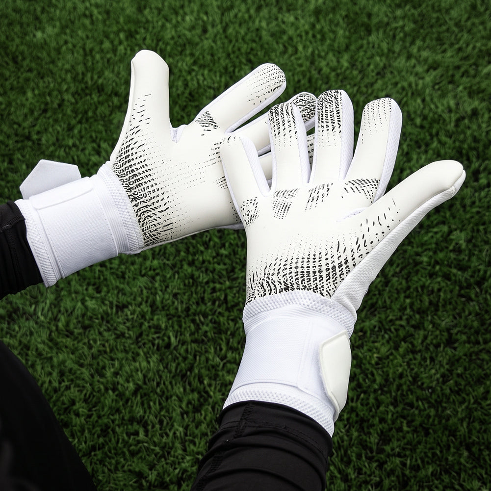 Keeper iD Electric Surge DuraTack NC goalkeeper gloves in White and Volt Green, worn close-up of the DuraTack hybrid latex palms