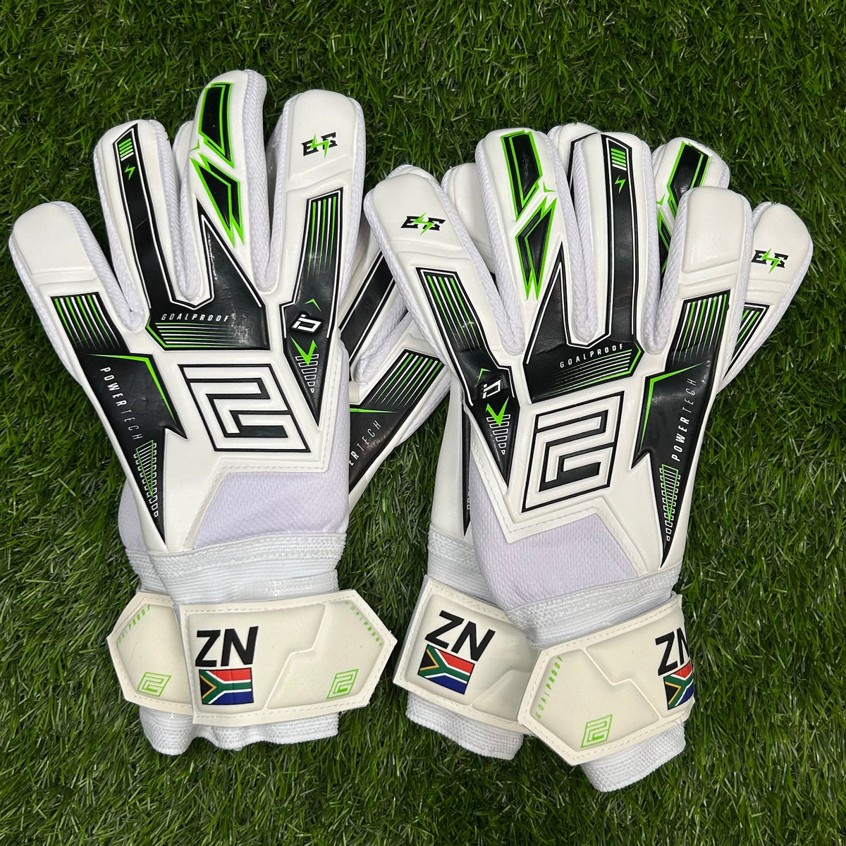 Keeper iD Electric Surge DuraTack NC junior goalkeeper gloves in White and Volt Green, personalised with initials and a flag on the wrist strap